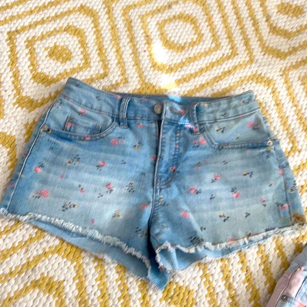 women’s denim short with pink flowers .only worn once They’re in Great condition